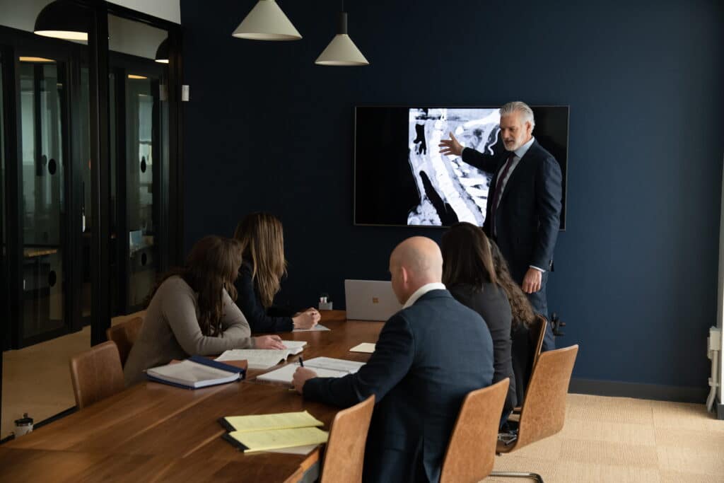 A meeting of the Elite Litigation Group evaluating x-rays