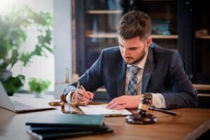 Catastrophic injury lawyer looking over paperwork