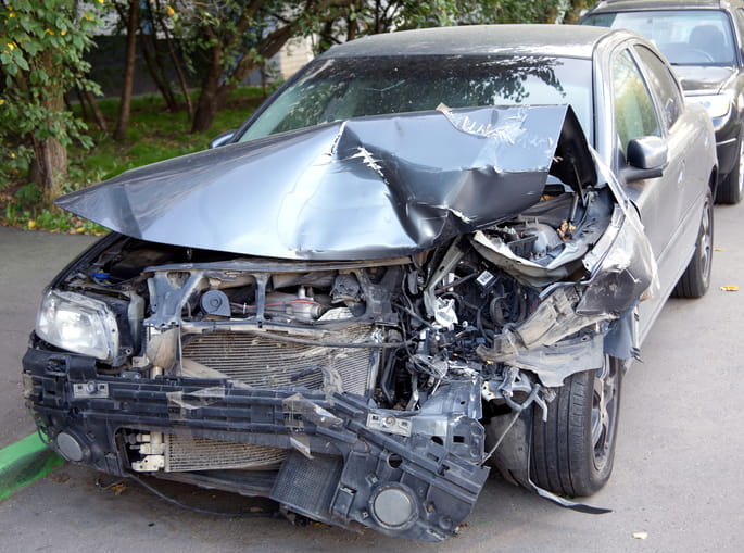 A severely damaged car after a car accident.