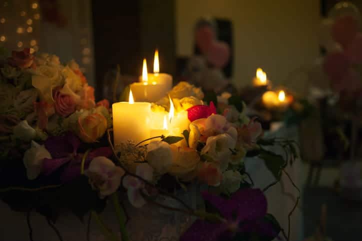 Candles lit during a memorial after a wrongful death.